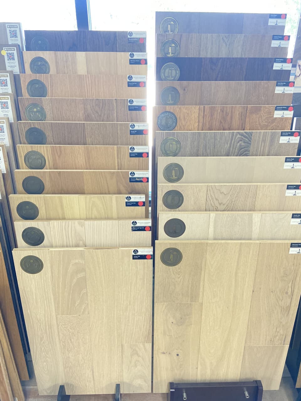 Coastline Hardwood and Dockside Hardwood oak and hickory flooring sample wall at Somervell Floors