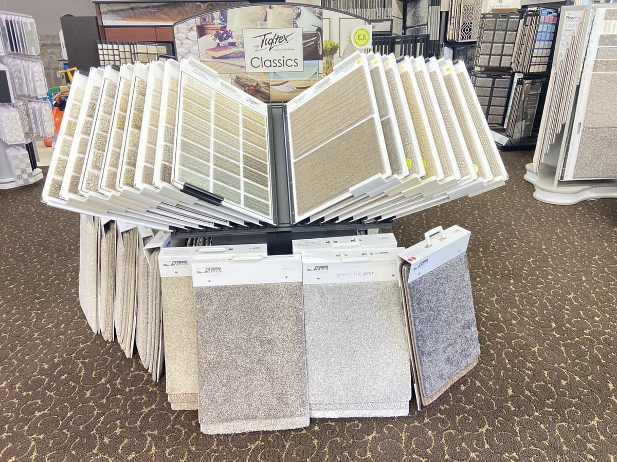 Tuftex Classics and Shaw Floors carpet sample display rack at the Somervell Floors showroom in Granbury, TX