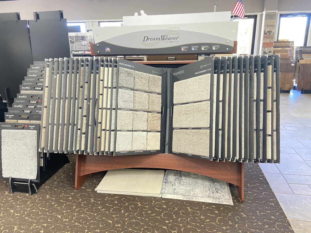 DreamWeaver PureColor carpet sample display featuring the Rustic Retreat and Gold Standard collections